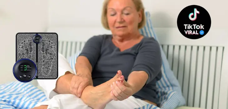 woman using Nooro EMS Foot Massager for her feet hurting